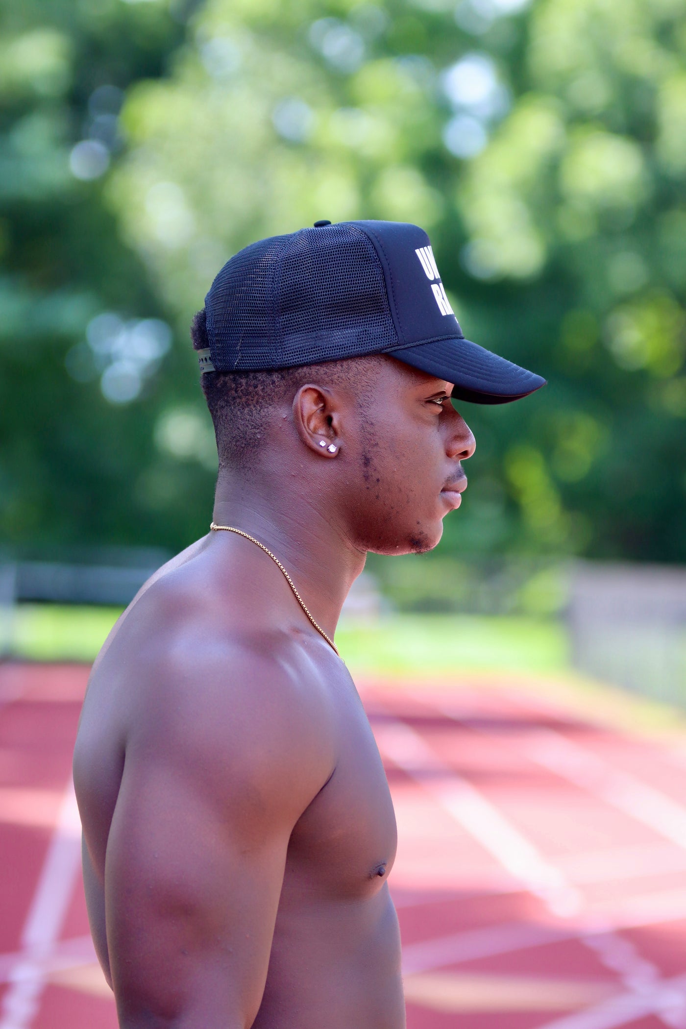BLACK TRUCKER HAT WITH WHITE FONT