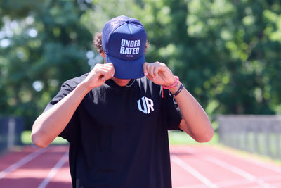 NAVY BLUE TRUCKER HAT WITH SKY BLUE FONT